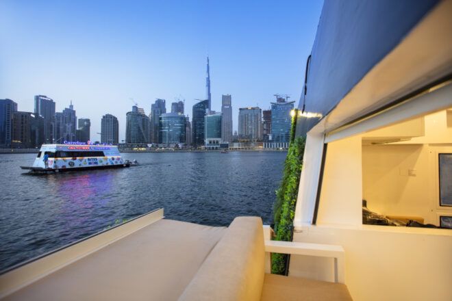 View toward the Dubai skyline in the evening from the edge of the pod