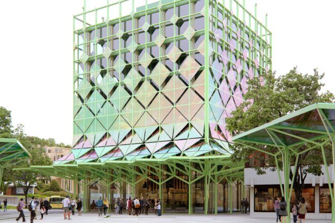A colorful multi-level building with a light green frame.
