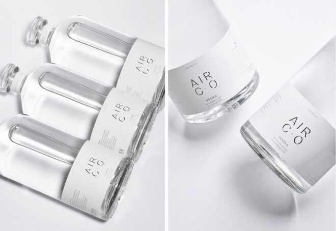 To the left, a line of clear bottles with white lables. To the right, two clear bottles.