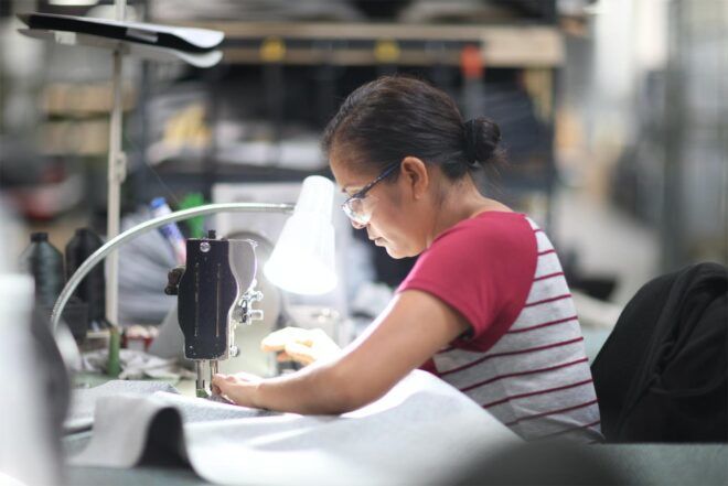 A person sitting at a desk working.