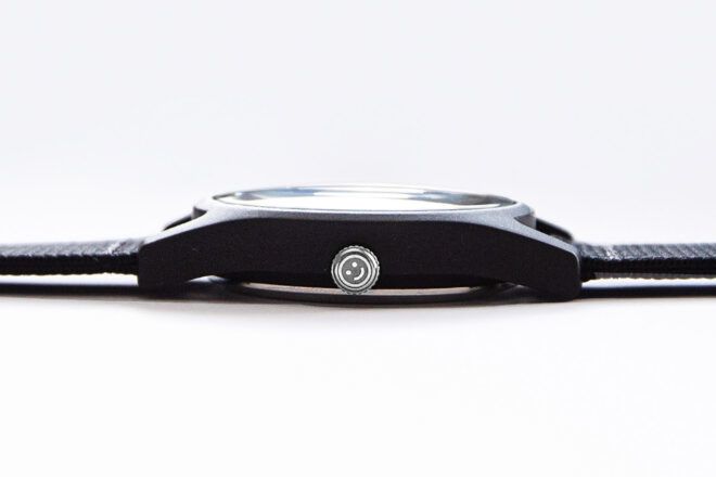 The side of a watch.