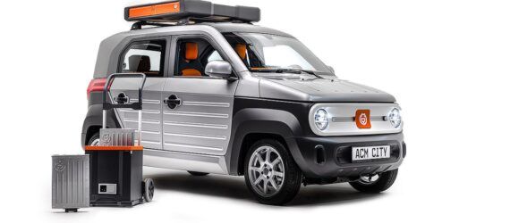 A black and silver car with orange highlights.