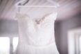 Wedding dress hanging on a hanger