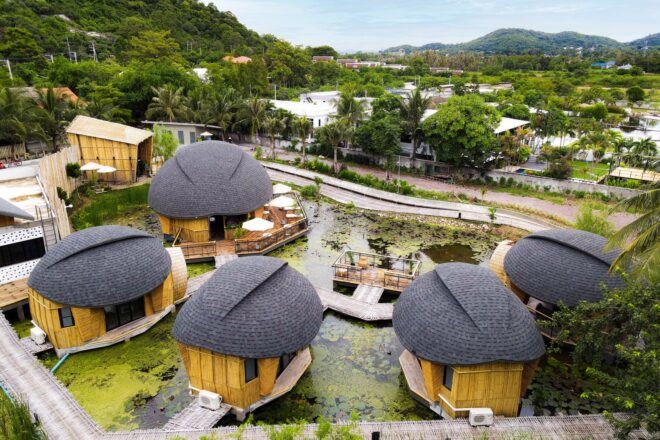 A view of five turtle shell-shaped structures facing the rural area of Hua Hin