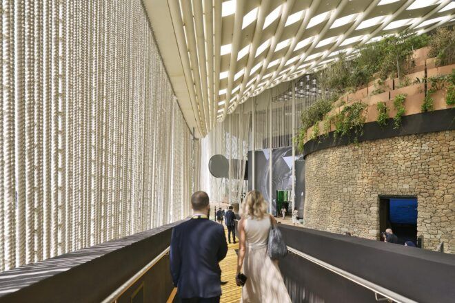 A rendering of people walking through the pavilion.