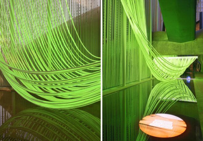Two images showing close-ups of the glowing green curtain system.