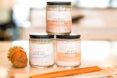 Collection of stacked bath therapy mixes, a bamboo scrubber brush and bamboo straws