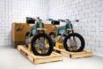Two e-bikes on wooden palettes.