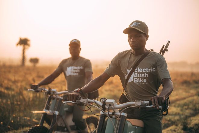 Two people on e-bikes.