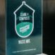 A green Clark Street Composts sign.