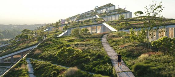A green structure on a hill.