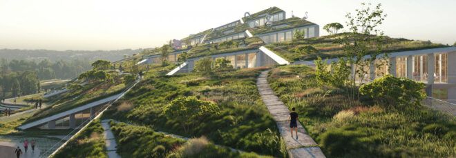 A green structure on a hill.