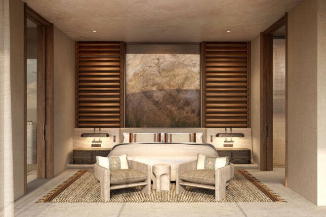 A bedroom/sitting room in neutral tones.