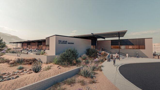 Exterior of university with the sign saying, "Utah State University Moab Academic Building"