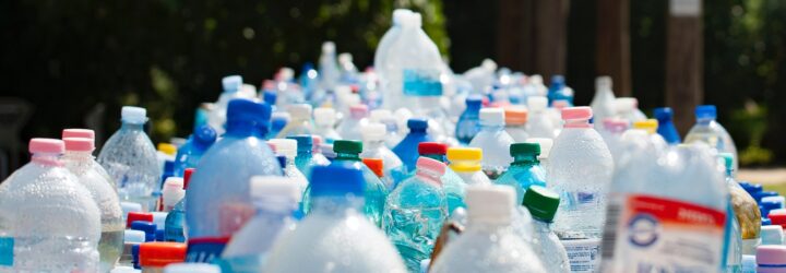 Plastic bottles lined up in a cluster