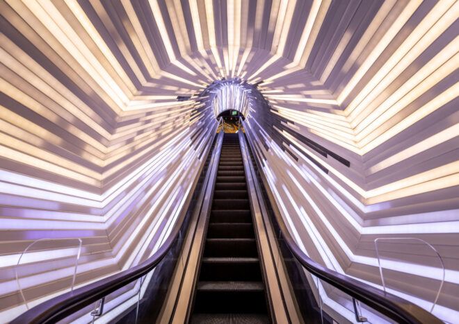 View looking up to the top of the space-time tunnel escalator