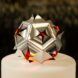 A spiky ball with cut outs in hexagonal shapes building it