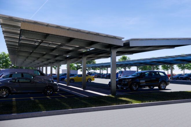 A parking lot with solar panel parking sheds.