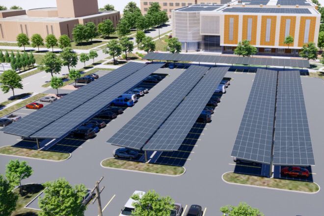 A parking lot with solar panel parking sheds.
