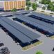 A parking lot with solar panel parking sheds.