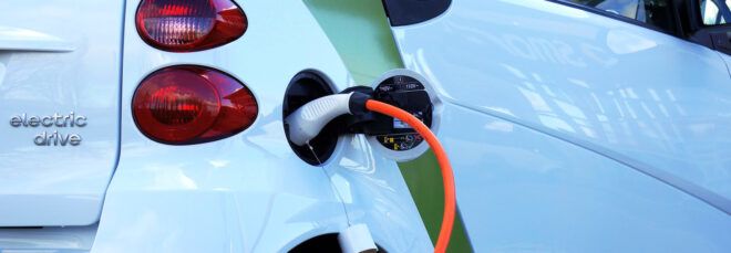 An electric vehicle being charged.