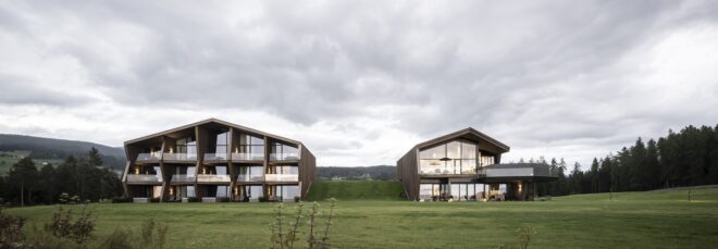 Two buildings sit far apart from each other