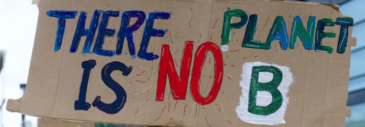 A protest sign reading 