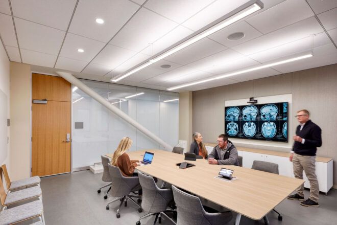 A psychology classroom looking at brain scans.
