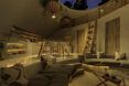 A rendering of the inside of a glamping dome decorated in a boho style.