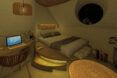 A rendering of a bedroom decorated in a boho style.