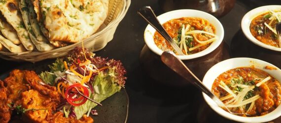 Curry bowls with a side of pita