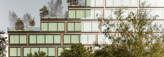A close up of the green windows zig zagging up like a staircase