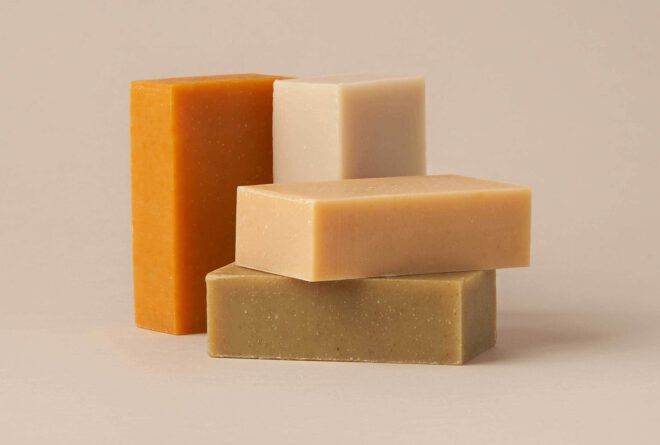 Several bars of soap stacked against each other.