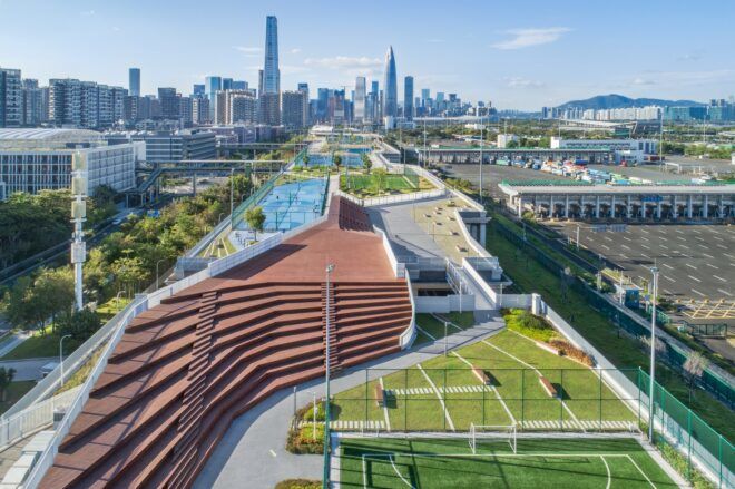 A strip of green space filled with spaces to walk and places to play