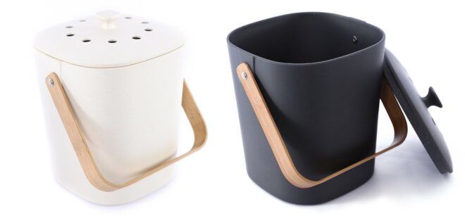 Two compost bins, one is white and one is black, both have bamboo handles