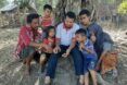 A Dompu farmer and family testing the app.