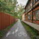 A road to the left of a home.