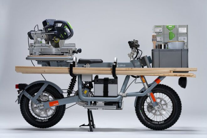 An e-bike against a gray background.