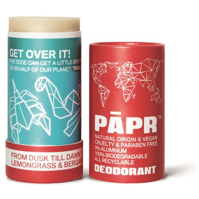 A red deodorant tube with the cab set beside it