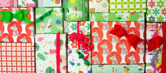 Different boxes of presents wrapped up and stacked on top of each other like Tetris