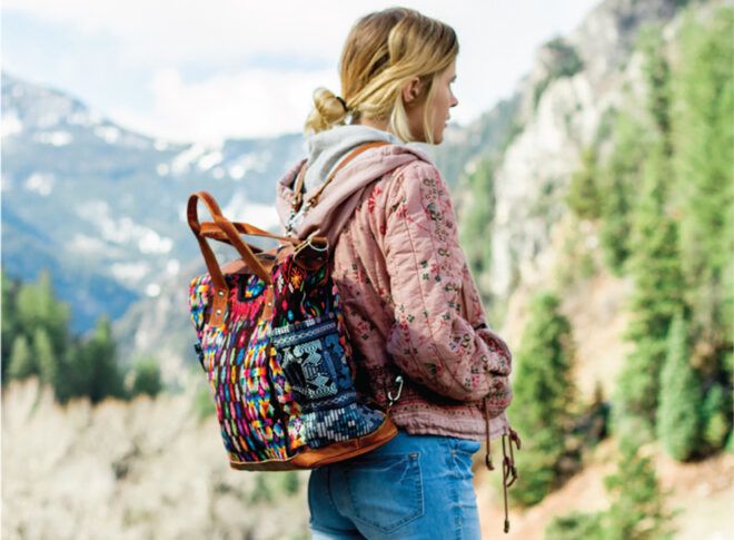 A person with a colorful backpack on.