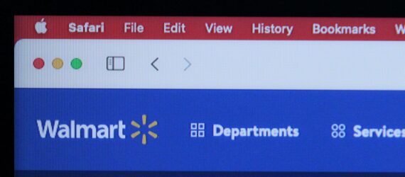 A safari browser open to the Walmart home page, a blue band of the website with the word Walmart at the corner