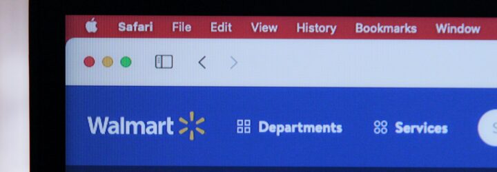 A safari browser open to the Walmart home page, a blue band of the website with the word Walmart at the corner