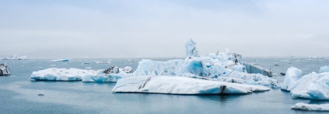 Ice blocks floating on a water bank