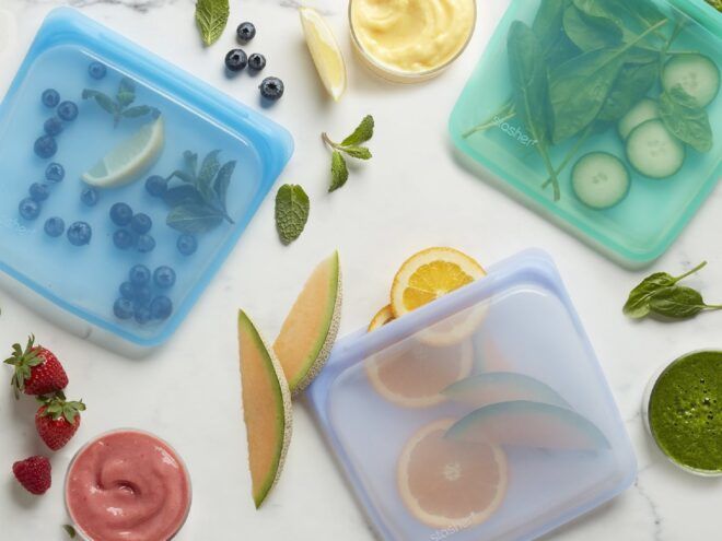 Three reusable bag filled with fruits