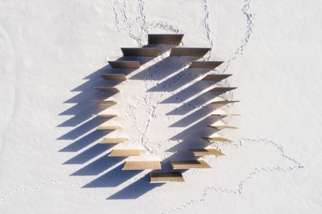 Wooden slats forming a circle in the snow
