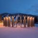 Wooden slats lined up horizontally in a curved figuration to create the art installation