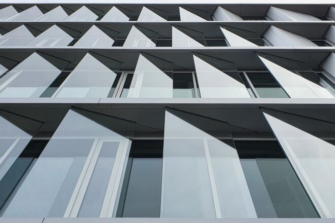 A close-up of the building's exterior glass louvers.