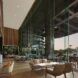 A seating area is next to a large glass wall