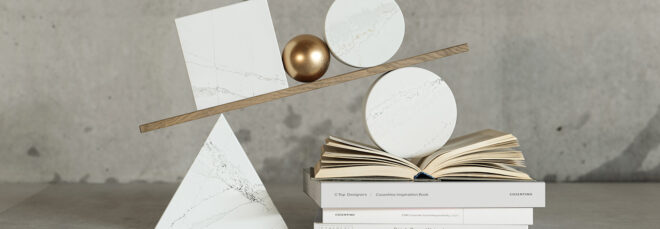 Several marbled objects balanced against each other.